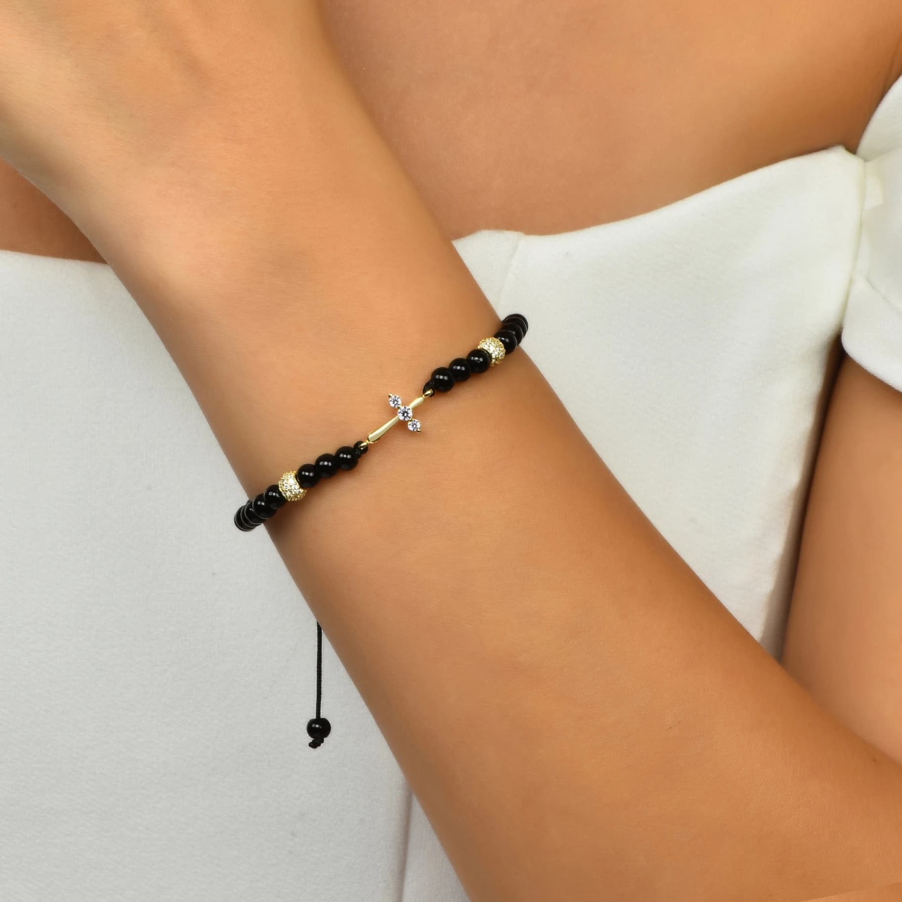Гривна с черни мъниста и златен кръст с бели цирконий - Image 2